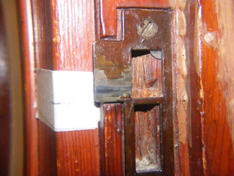 This is the strike plate for the closet door. You can see where the latch has worn off the finish at the bottom of the hole.
