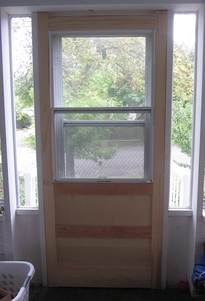 Tatty door is in place on the other side of the frame.
