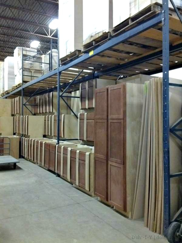 One of several aisles of cabinets.