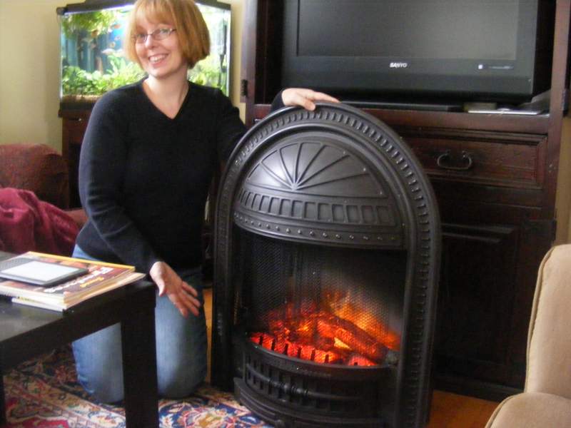 And this is the fire and surround together, modelled by the lovely Stacey.